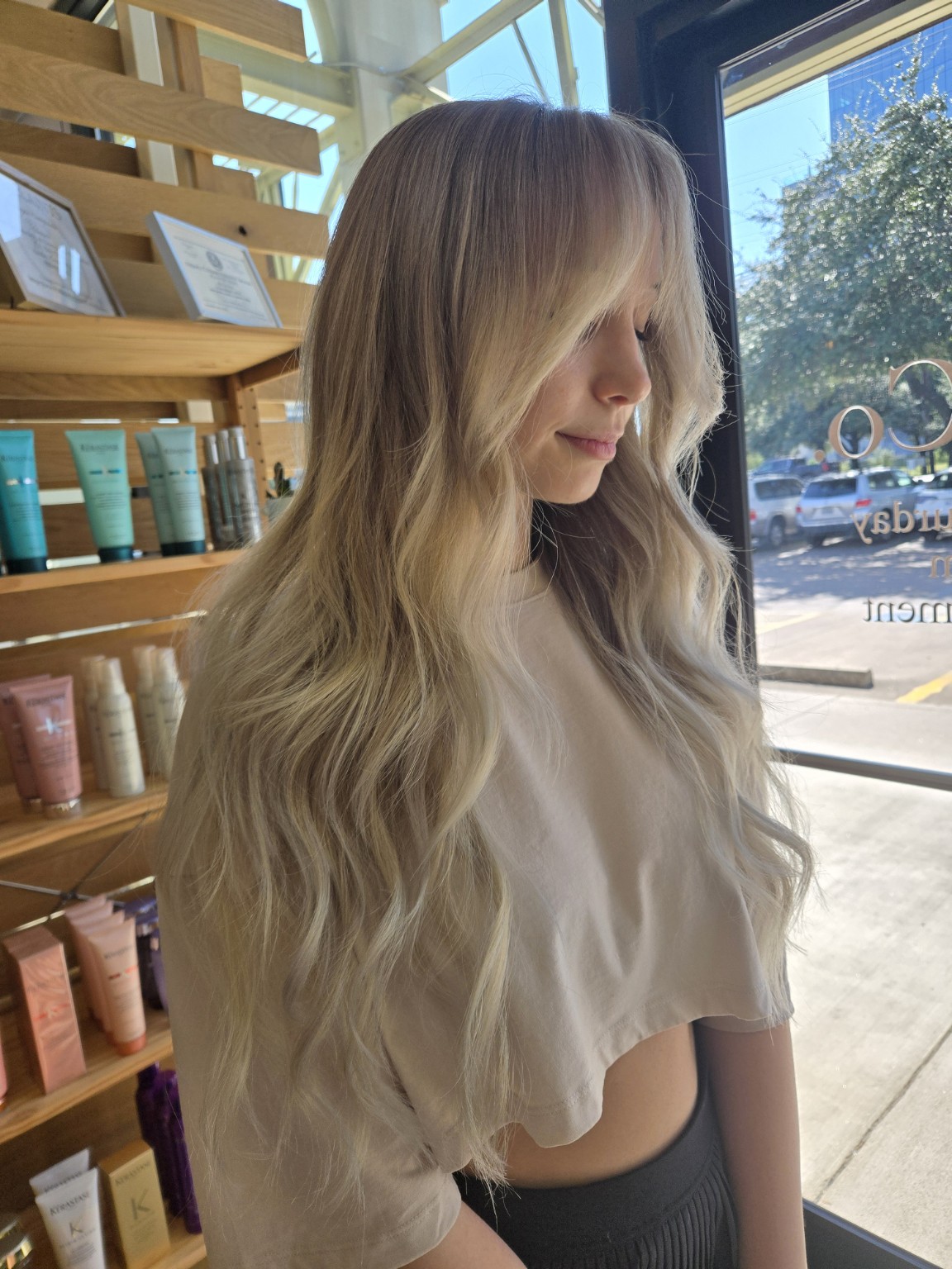Long blonde dimensional hair by BLENDEDHUESATX in Austin, Texas